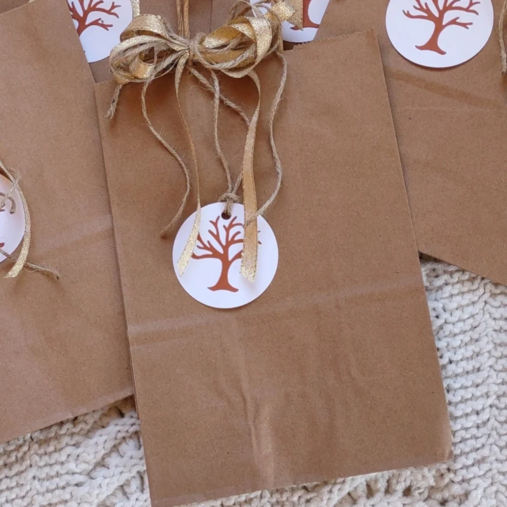 7 Brown gift bags with handmade tags